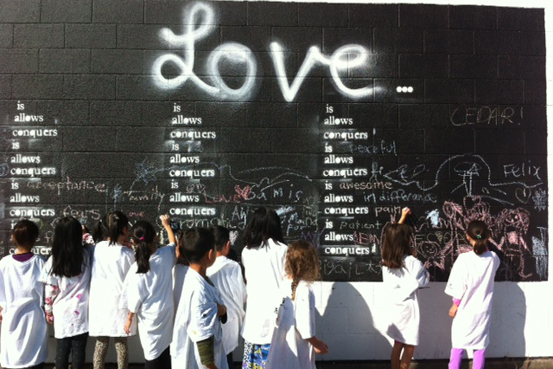 SEPTEMBER 2014: Our Chalk Walls debuted for Culture Days 2014 – and Granville island visitors continue to consider what love means to them. The project was inspired by the global art movement, Before I Die.