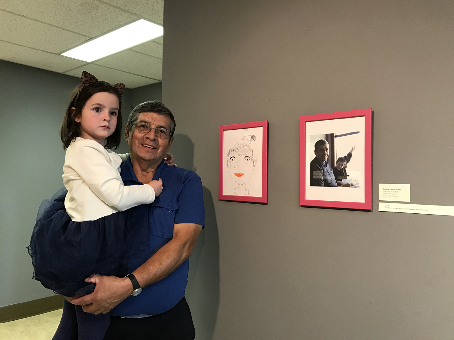 Daphne with her best bud and grandpa at the exhibit at the Yukon Arts Centre
