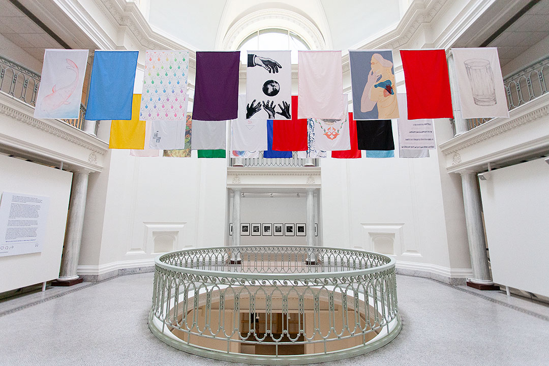 Colourful flags exhibited at Vancouver Art Gallery's rotunda