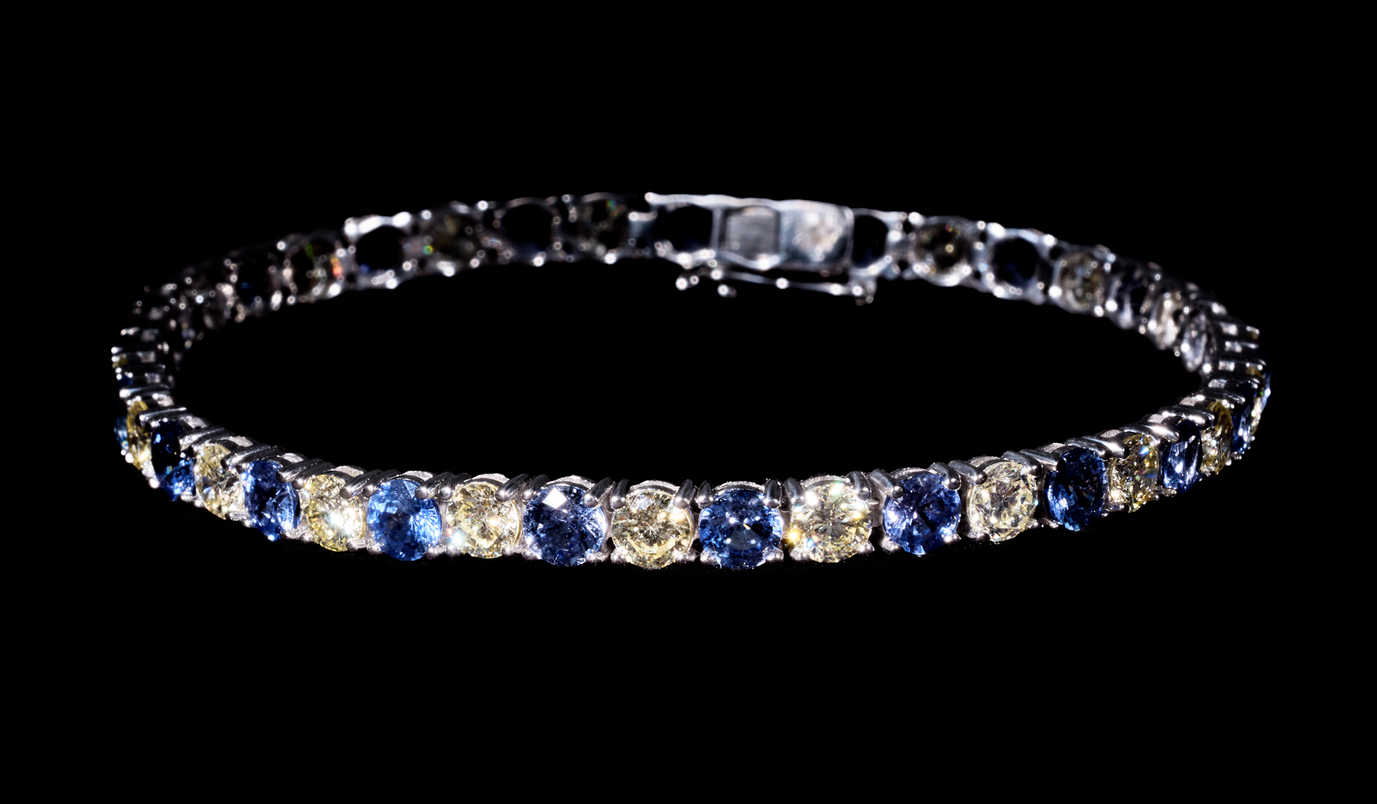 Win a 14 Karat White Gold Diamond and Sapphire Tennis Bracelet